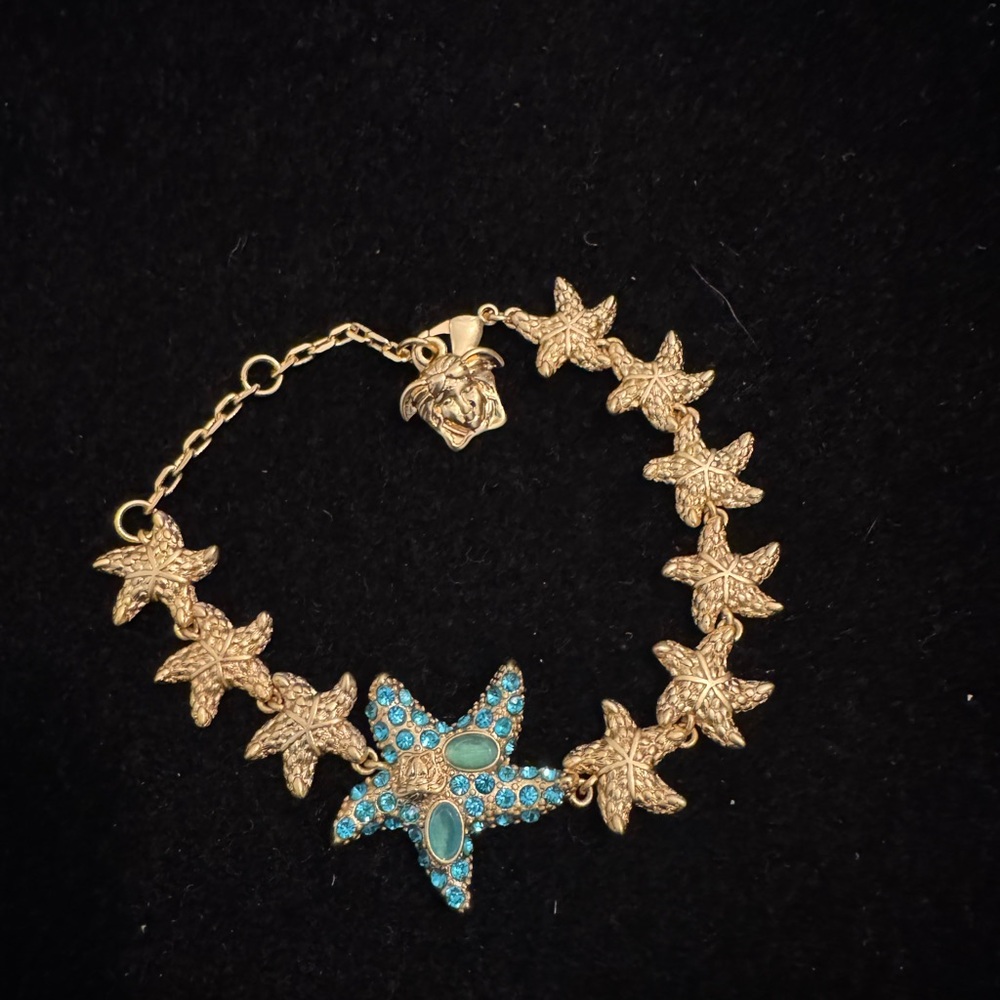 Versace Gold Starfish Bracelet with Blue Accents
